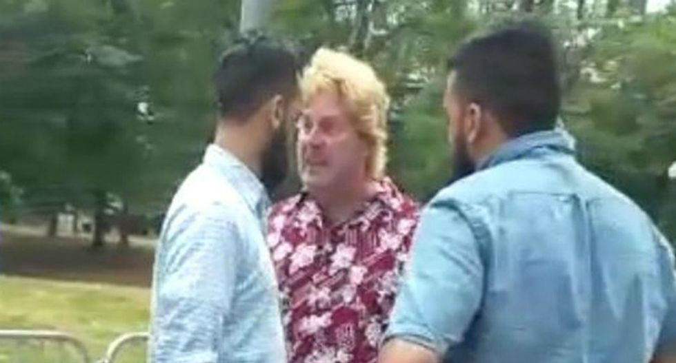 WATCH: White man goes bonkers after spotting a Muslim family in public — and threatens to kill them