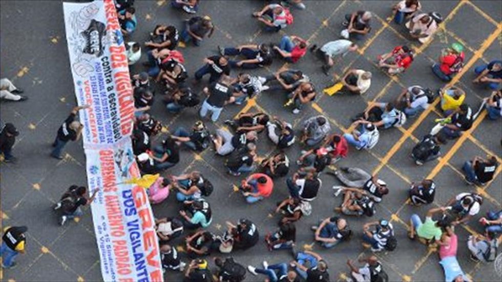Rio airport workers declare 24-hour strike on opening day of the World Cup