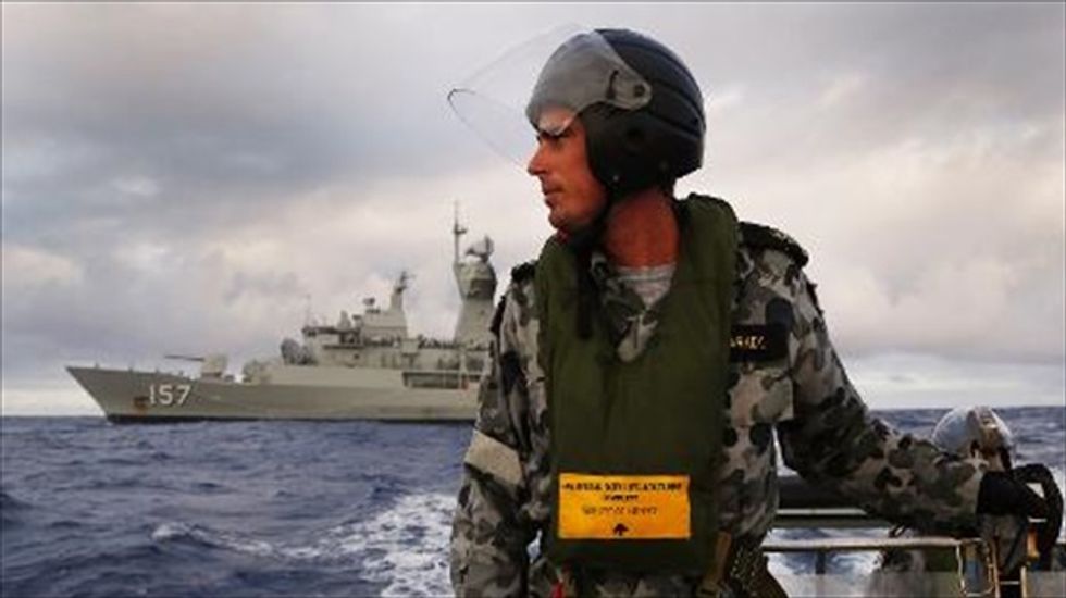 Debris found on Australian beach not from missing Malaysia Airlines jet
