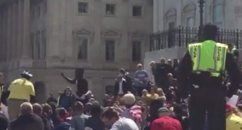 Police arrest 400 protesters in 'Democracy Spring' demonstration at US Capitol