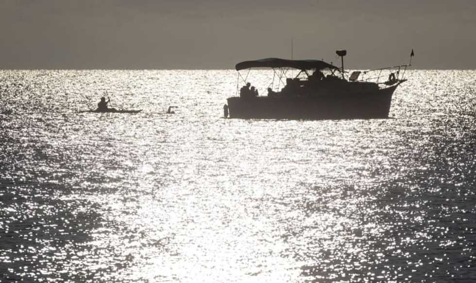 After losing father and sister to ALS, Illinois man swims nearly 20,000 strokes to raise funds