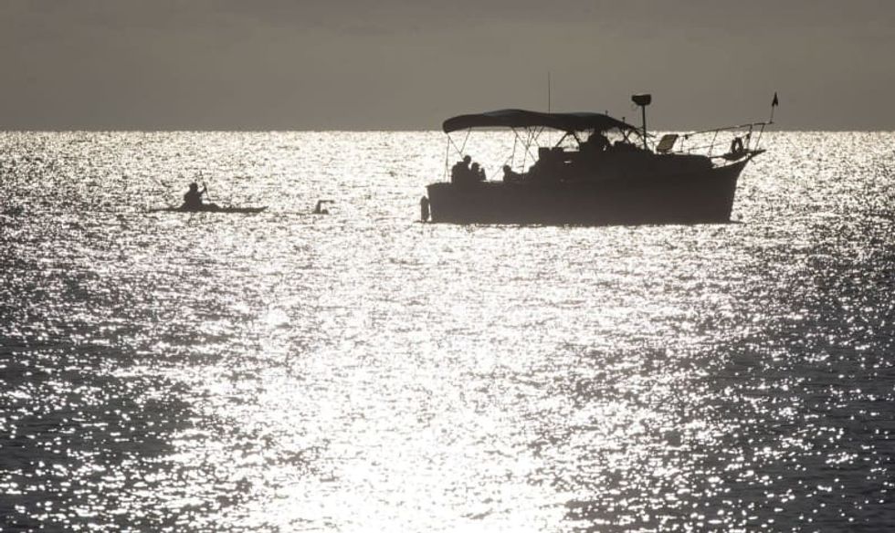 After losing father and sister to ALS, Illinois man swims nearly 20,000 strokes to raise funds