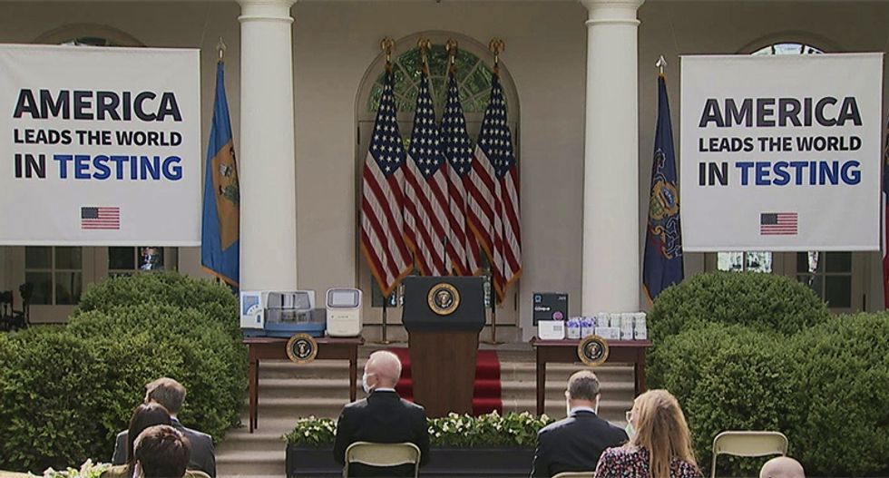 Trump fact-checked for his Mission Accomplished-style banners at White House briefing