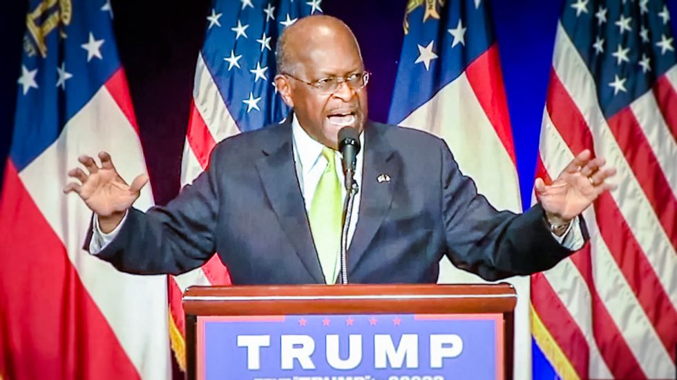 Herman Cain anoints 'shucky ducky' Donald Trump as 'not a racist' at Atlanta rally