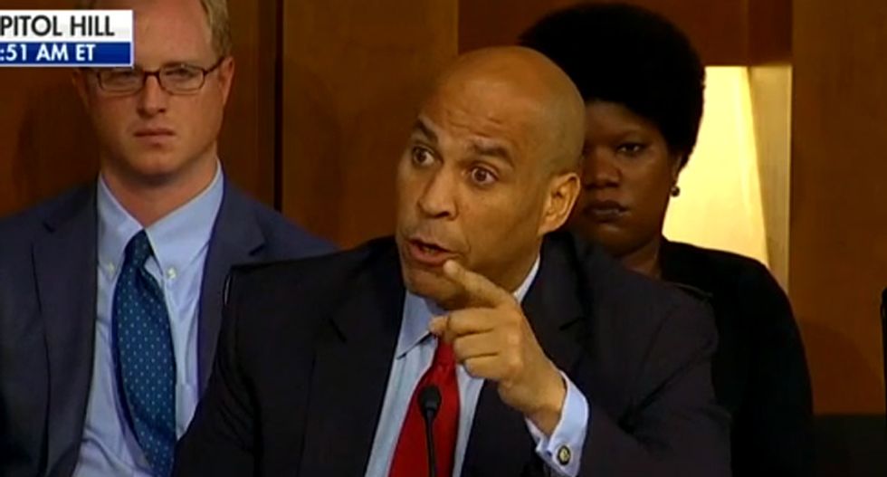 Kavanaugh hearing starts in chaos as Cory Booker infuriates GOP by daring them to punish him for leaking documents