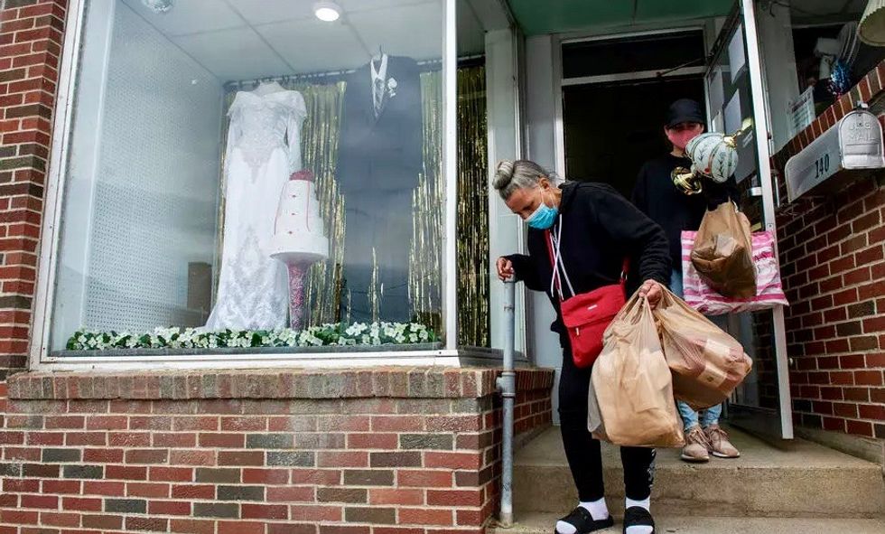 Seven dead, dozens infected after 'superspreader' wedding in rural US