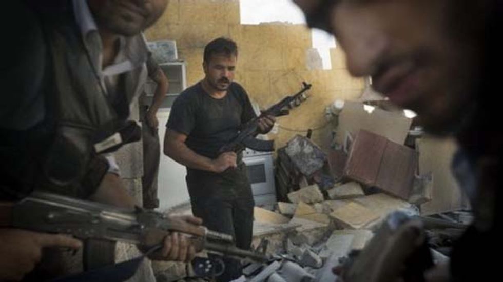 Syria rebels fracturing as the Free Syrian Army condemns jihadists