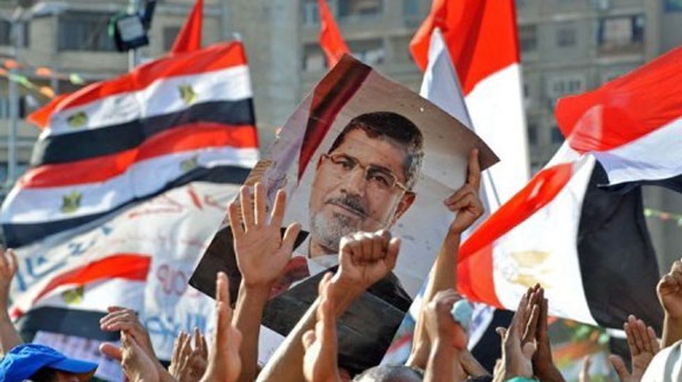Egypt court sentences 12 Morsi supporters to death over shooting of police general