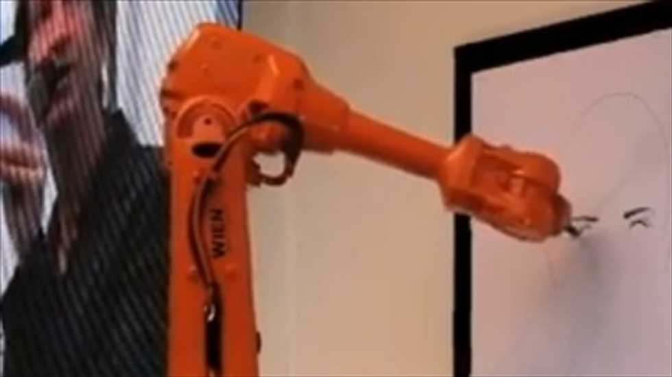 Artist uses robots to create same picture in three different countries