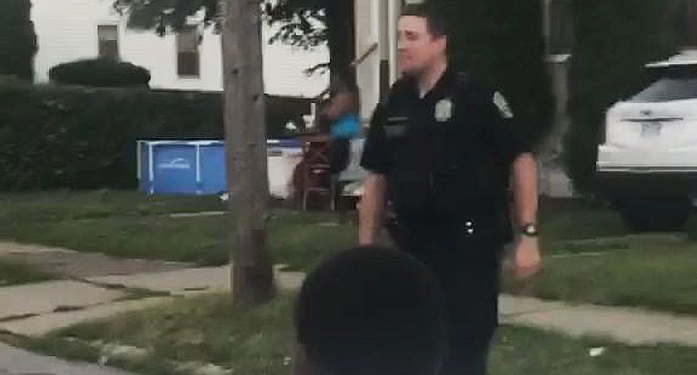 Neighbor calls police on black kids playing football — and Buffalo cops show up and join their game