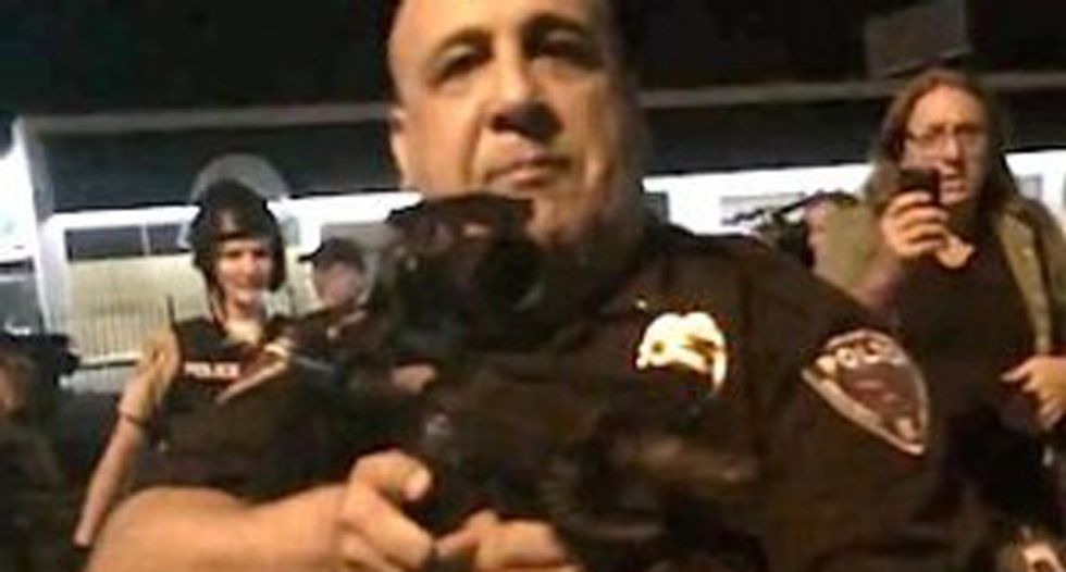 Ferguson cop says life is 'ruined' after pointing AR-15 at journalists and saying, 'I’m going to f*cking kill you!'