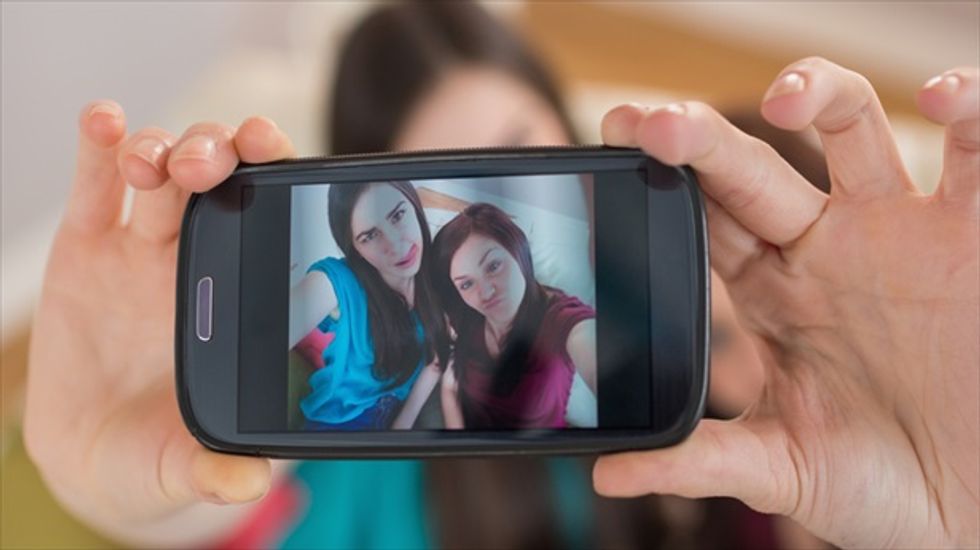 Teen charged with distributing underage explicit photos for Tweeting nude selfies