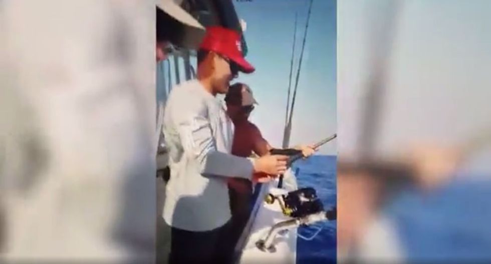 Laughing Florida bros caught on video shooting a hammerhead shark