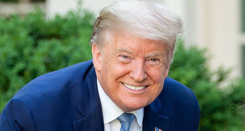 'It's an alternate universe right now': CNN analyst says Trump is pretending the pandemic doesn't even exist