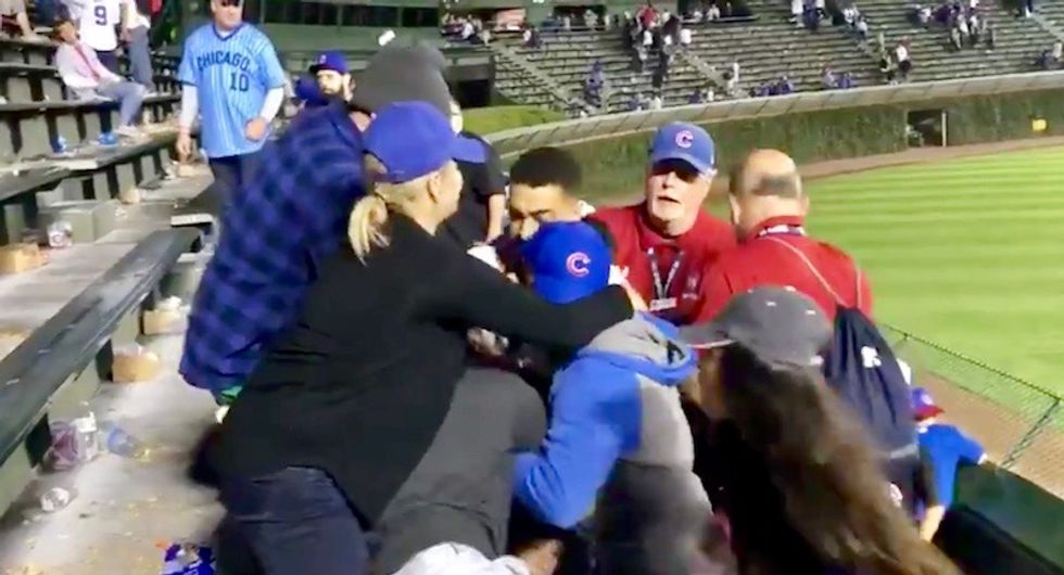 Watch: Racist white Chicago Cubs fans attack Hispanic man in bleacher brawl -- security takes Hispanic man away