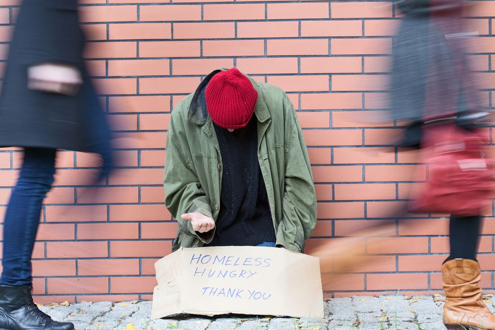 U.S. food banks struggle to meet new demand caused by food stamp cuts