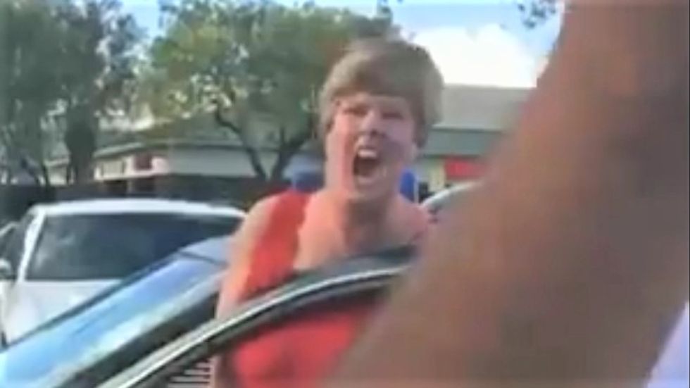Unhinged woman goes on profane rant against 'you Hawaiians' when cop asks her to stop blocking traffic
