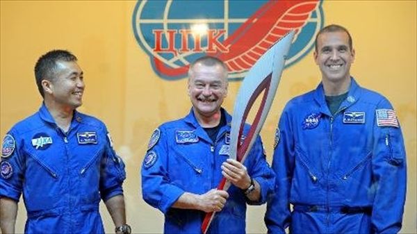 Russia sends Olympic torch to International Space Station