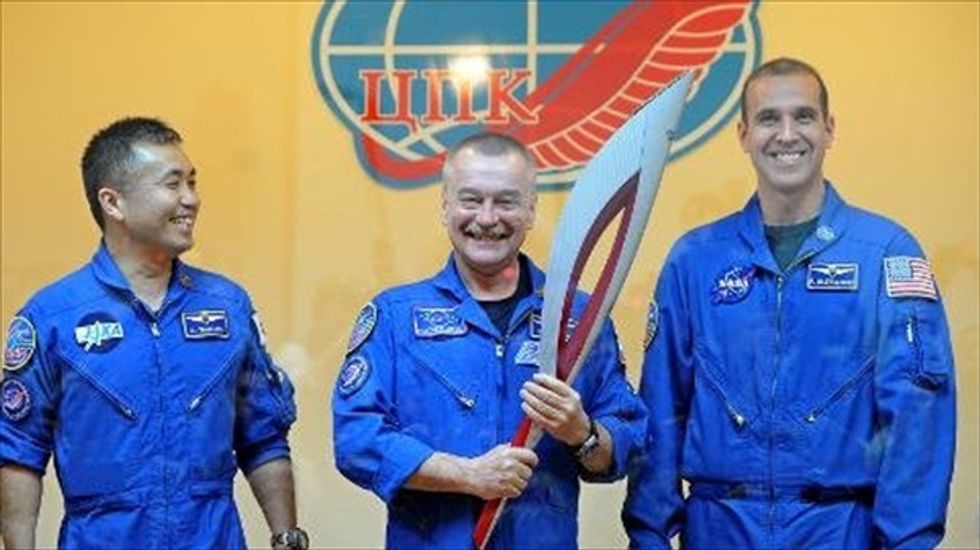 Russia sends Olympic torch to International Space Station