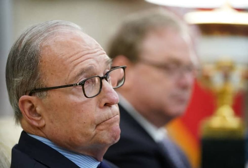 Despite White House virus cases, top aides defend reopening