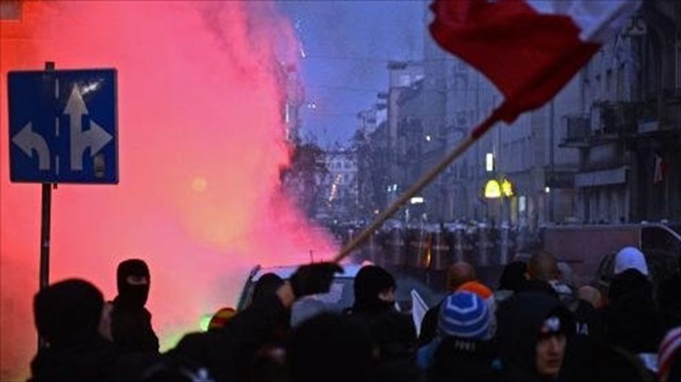 Thousands of protesters converge on Russian embassy in Poland