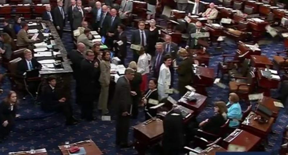 Anti-Monsanto protesters pelt senators with cash during vote on food labeling bill