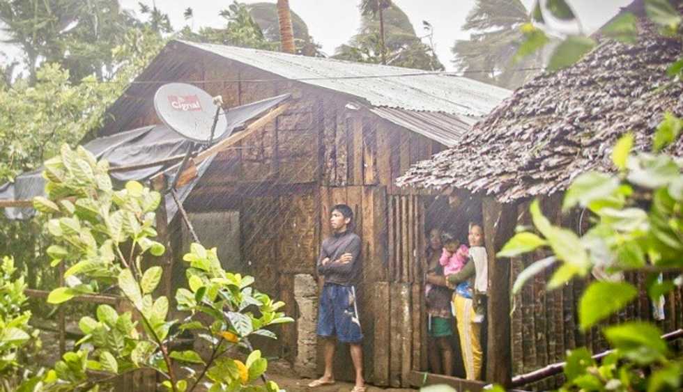 Powerful storm forces thousands from homes in virus-hit Philippines