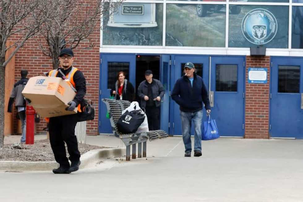 Factory workers wary as Detroit's 'Big 3' begins to motor back up