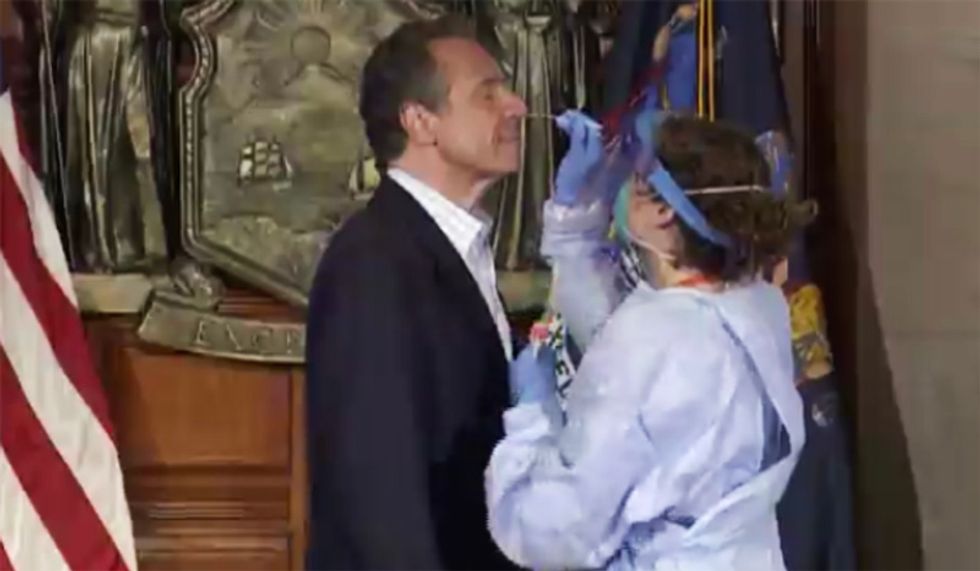 New York Gov. Andrew Cuomo takes a COVID-19 test on air to show it's painless and easy