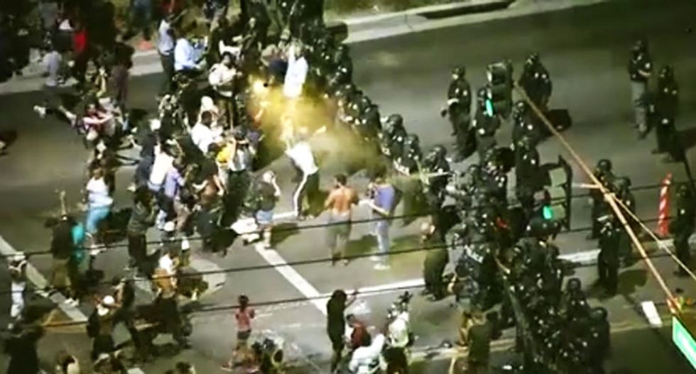 WATCH: Phoenix police in riot gear hose down anti-brutality protestors with pepper spray