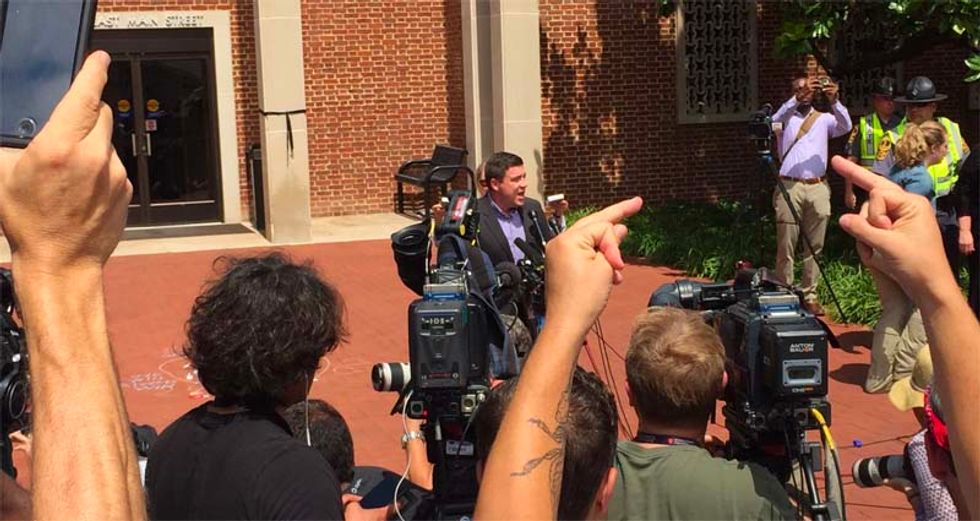 'Get the f*ck out of here, coward': Watch the Charlottesville march organizer chased from his press conference