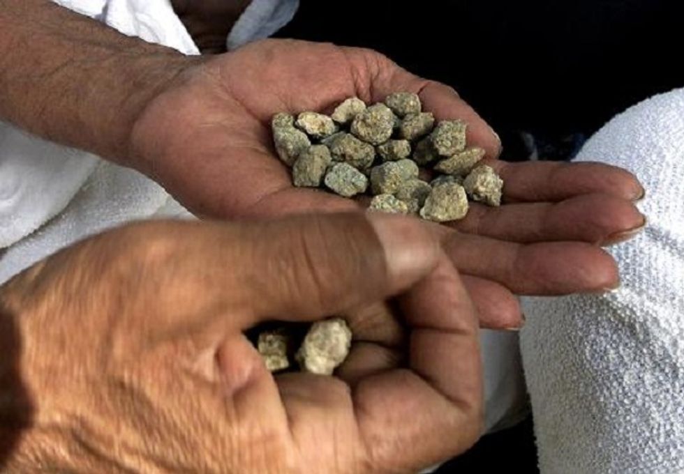 Afghanistan considers public stoning for adulterers