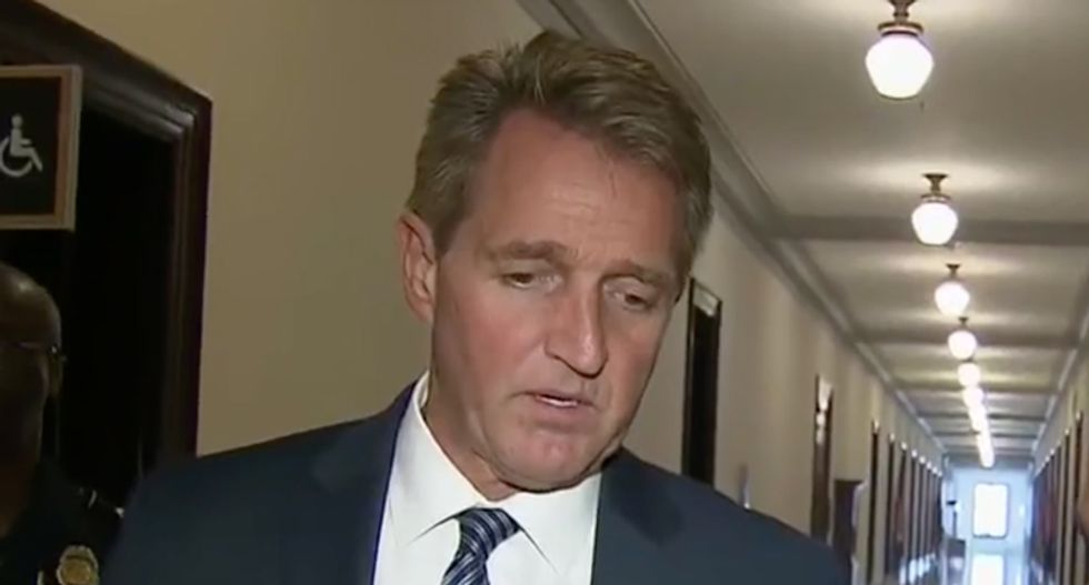 Jeff Flake plays down Kavanaugh's lies about drinking in exchange with CNN reporter: 'Exaggerating your success or failures is something a lot of people do'