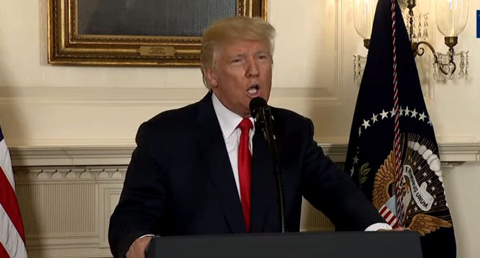 Trump defends response to Charlottesville violence at Arizona rally