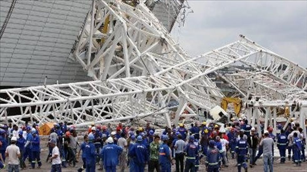 Brazil will use damaged World Cup stadium despite workers' deaths