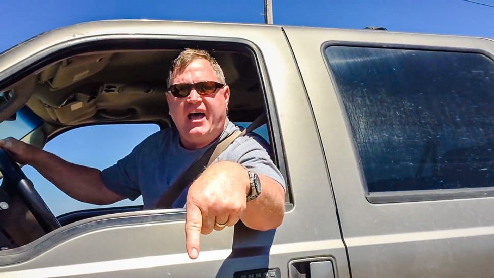 Raging anti-Hillary nut faces assault charges for trying to run over photographer with SUV