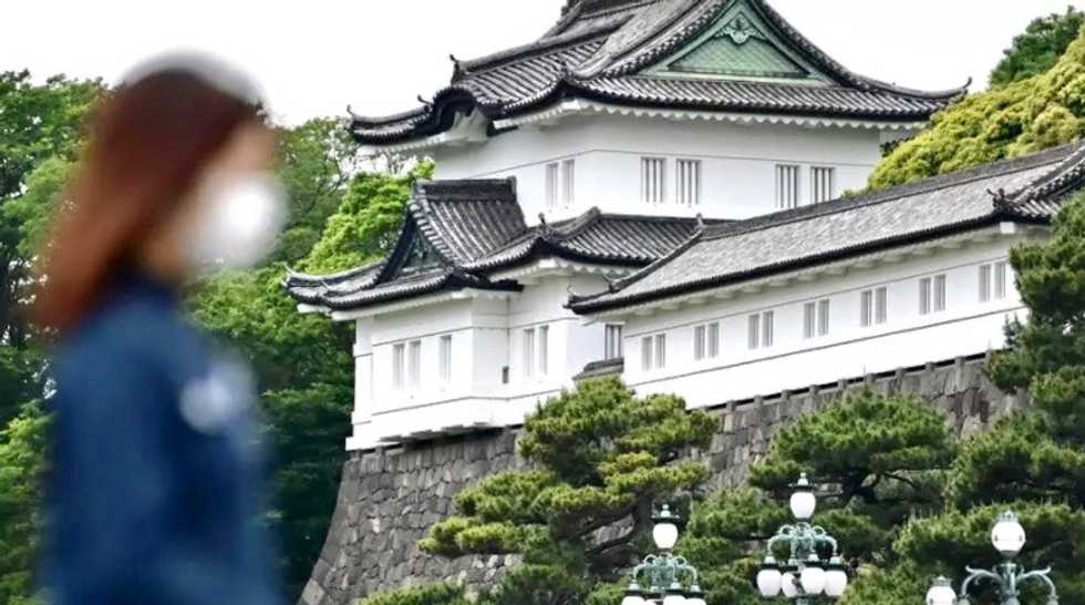 Man arrested after swimming moat to enter Japan palace grounds