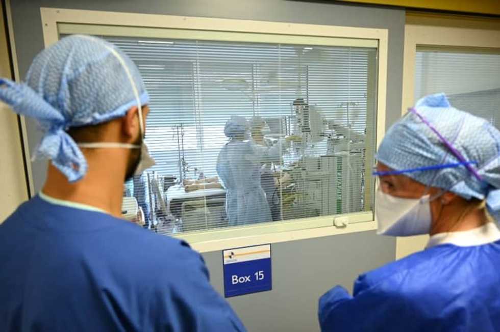 WHO warns 2 million virus deaths possible -- while Australia urges vaccine-sharing