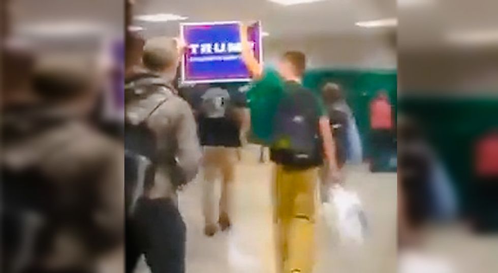 Video catches students shouting 'white power' while marching with Trump sign at Pennsylvania school