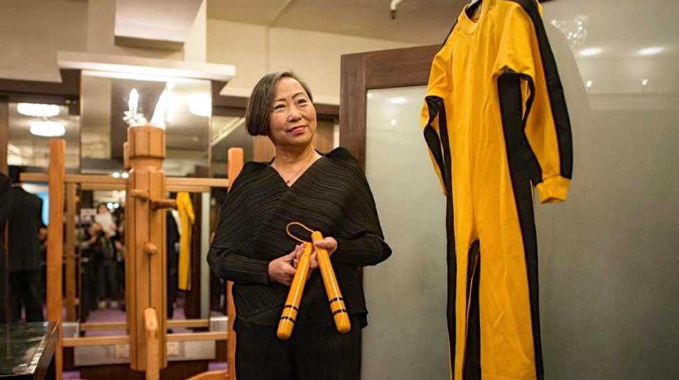 Bruce Lee's famous yellow-and-black jumpsuit fetches more than $100,000 in Hong Kong auction