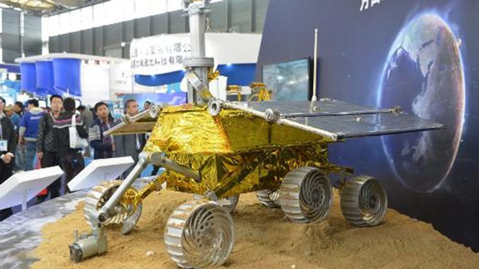 China's first lunar rover enters the moon's orbit