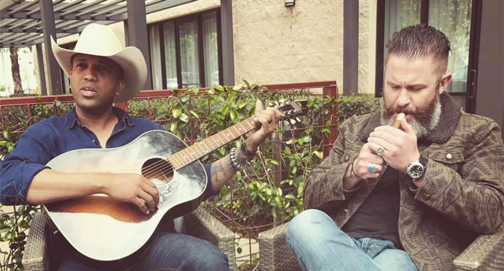 Millionaire entrepreneur attacks 'gangsta' George Floyd protesters and adds photo of his Black friend to call out 'virtue signaling'