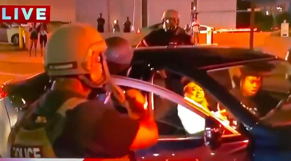 WATCH: Young Black couple Tasered and pulled from car by mob of Atlanta police for reportedly breaking curfew