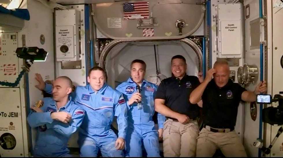 US astronauts enter space station in milestone mission