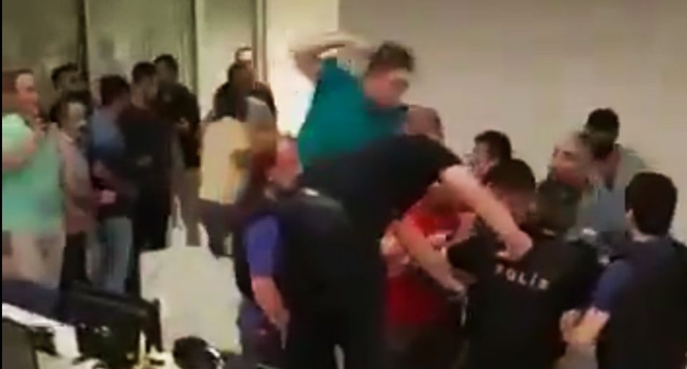 WATCH: Turkish police and reporters pummel soldiers attempting to take over CNN newsroom