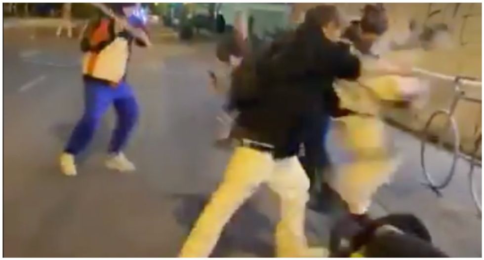 WATCH: White men brandishing machete attack and beat nonwhite protester in Minneapolis
