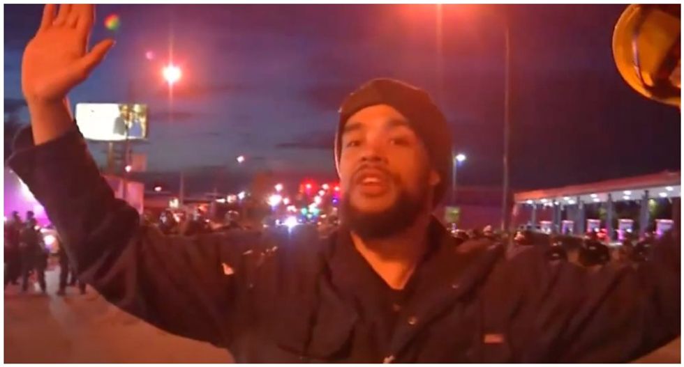 Video shows NY riot cops tackling black man from behind as he is interviewed by local news outlet