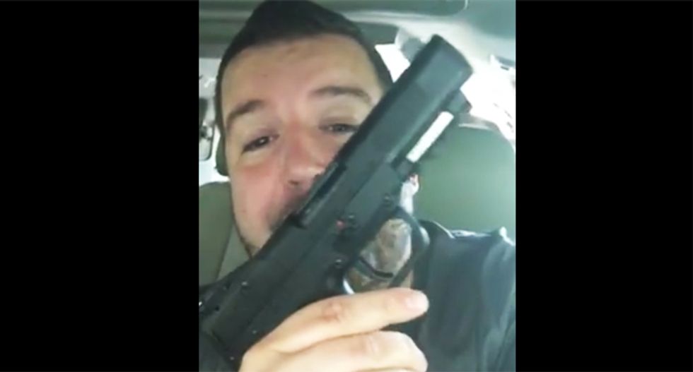 Gun-packing pastor threatens to pump anyone who threatens cops with '20 rounds of pure brutality'