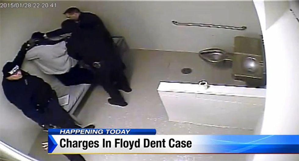 Detroit 'RoboCop' officer charged after videos show brutal beating of drug suspect
