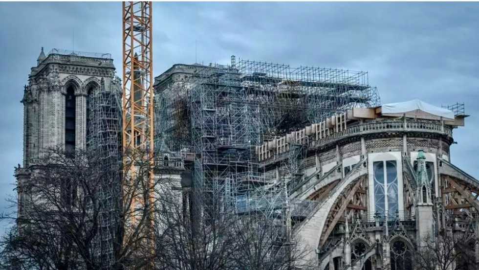 Delicate work of dismantling Notre-Dame’s charred scaffolding begins